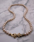White Hand-knotted AAA Freshwater Pearl Bow Necklace