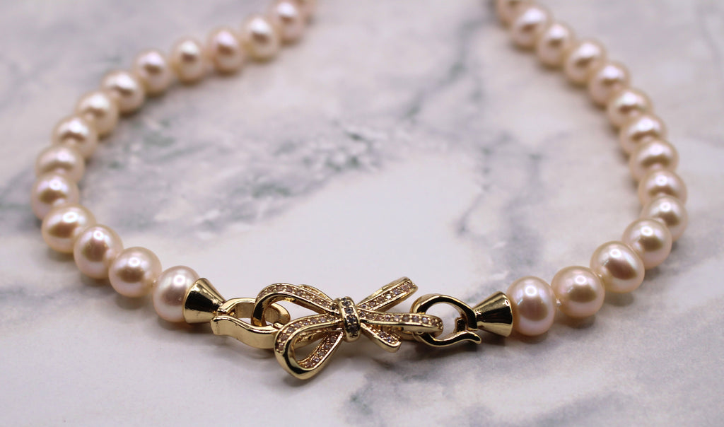 White Hand-knotted AAA Freshwater Pearl Bow Necklace